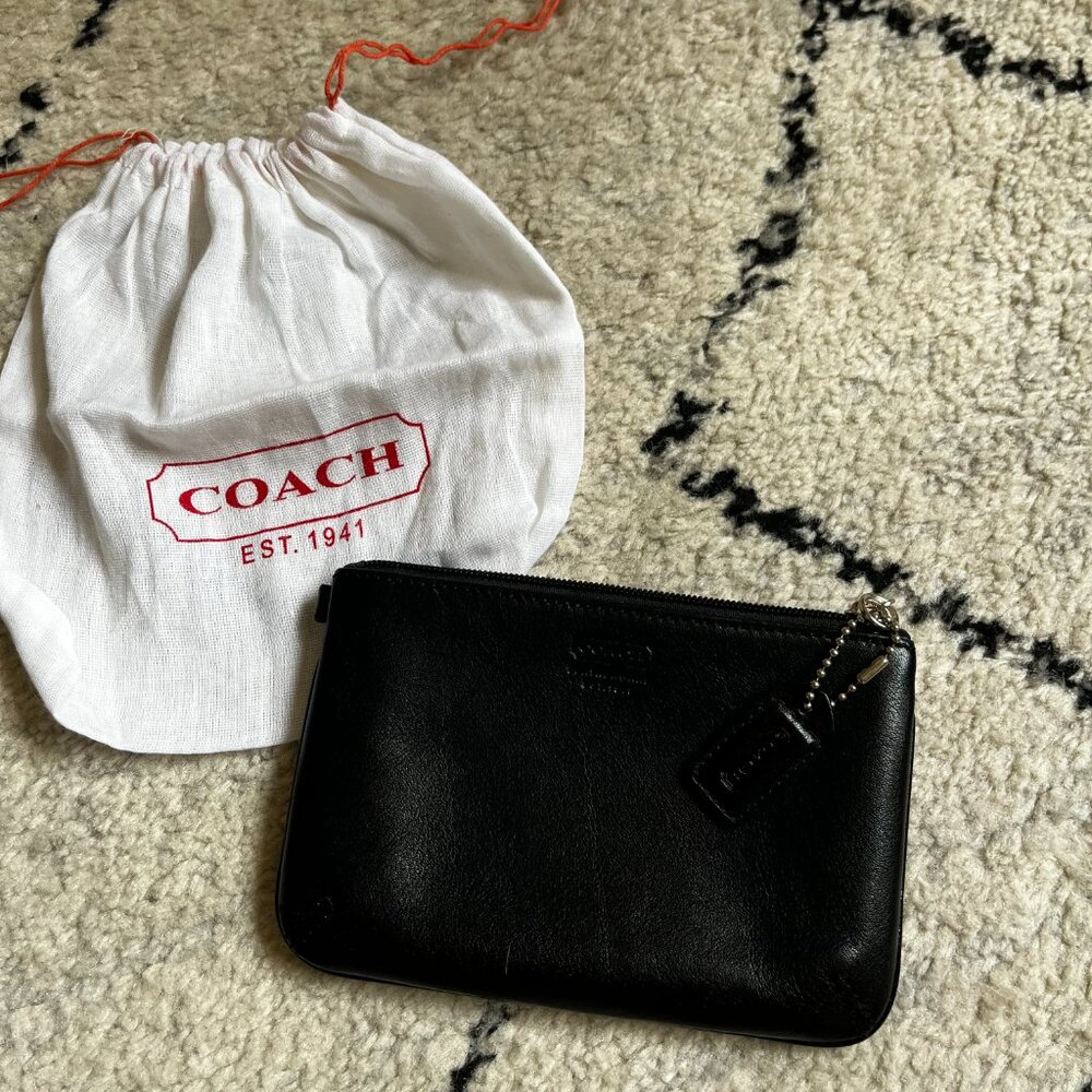 Coach zipper wallet or pouch  (4Hx6W). Holds money, lipstick, pills, passport...